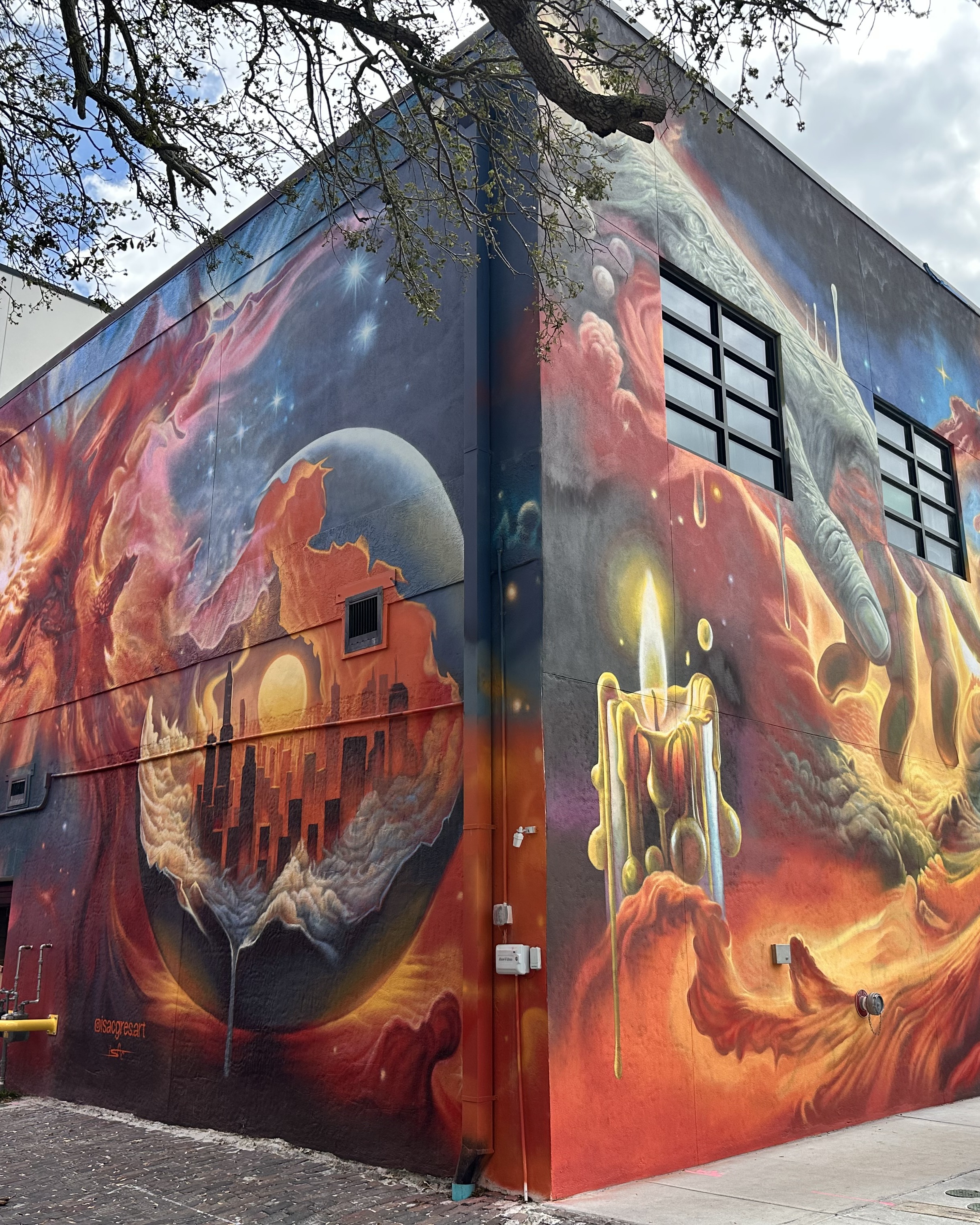 Cosmic surrealism mural by Isac Gres on the Melting Pot