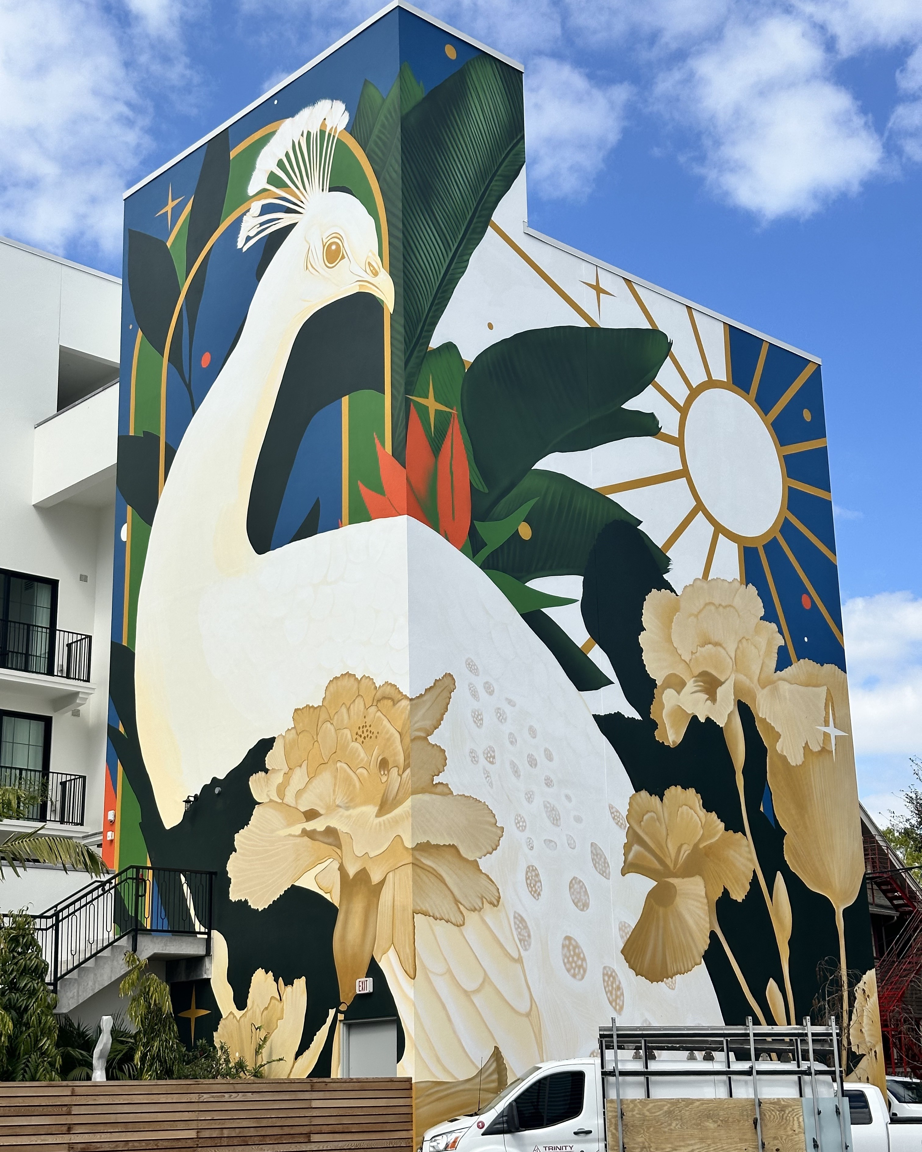Five-story white peacock by Aaron Tullo on the Cordova Inn