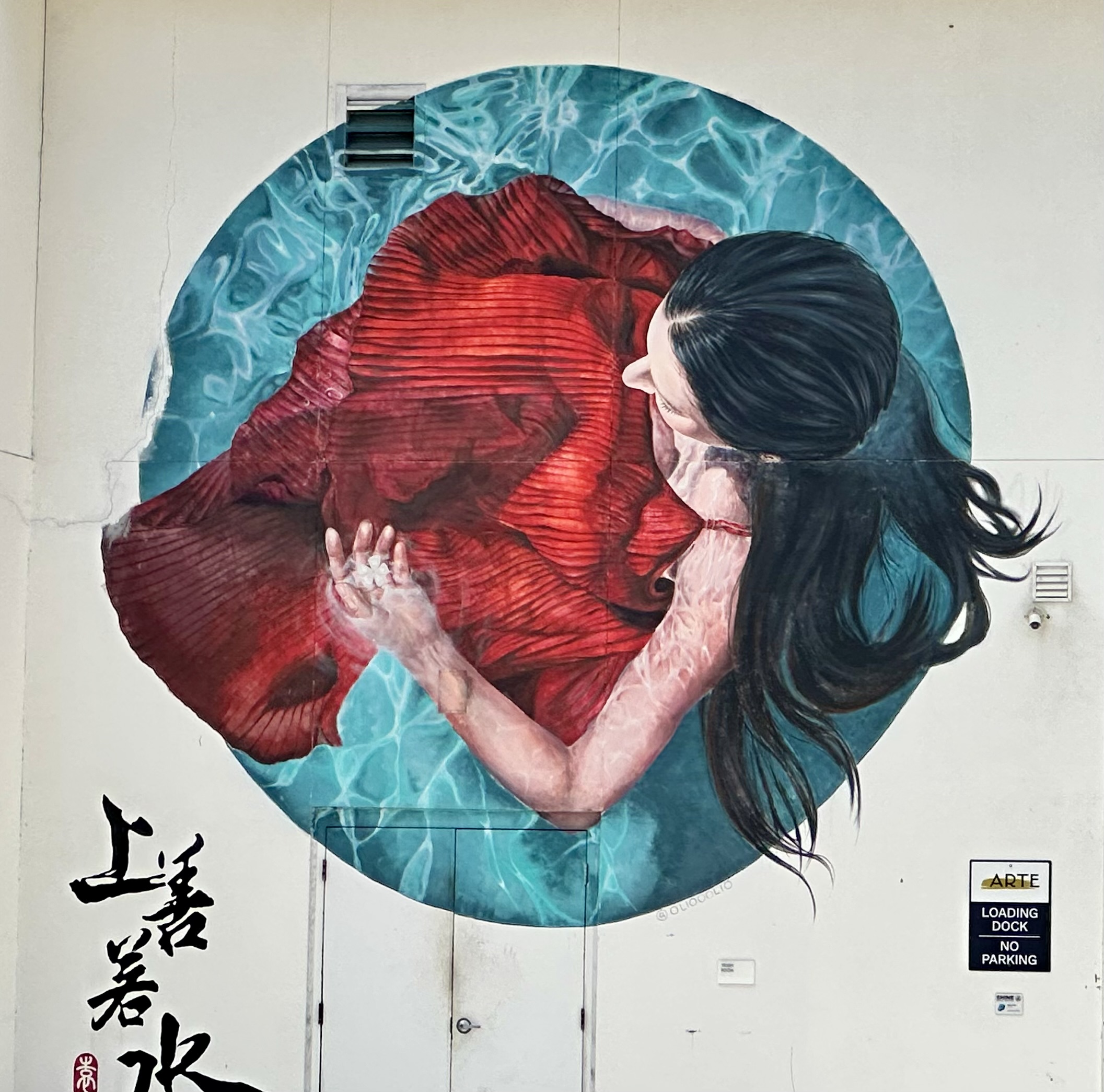 Lili Yuan red figure in water