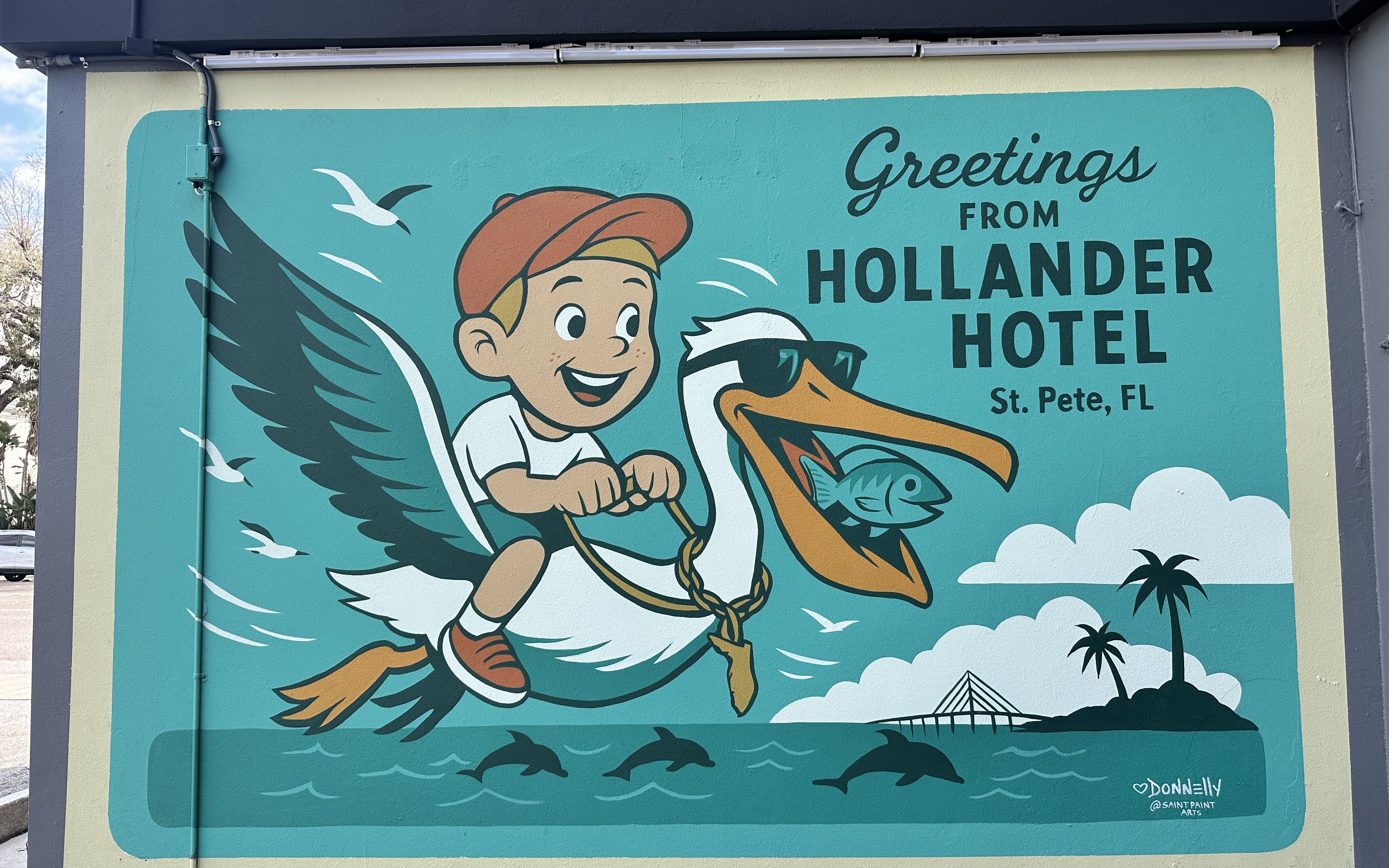 Greetings from Hollander Hotel postcard pelican by Derek Donnelly